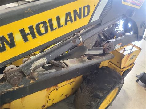 new holland skid steer l225 hydraulic cylinder|nh l225 for sale.